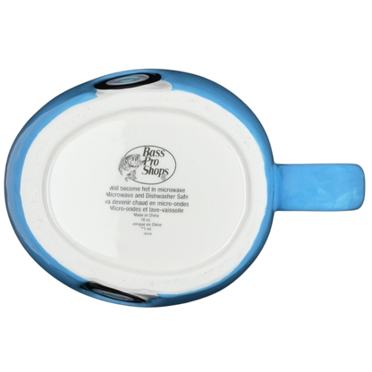 Bottom view of the Happy Camper blue RV Bass Pro Shops mug with care instructions