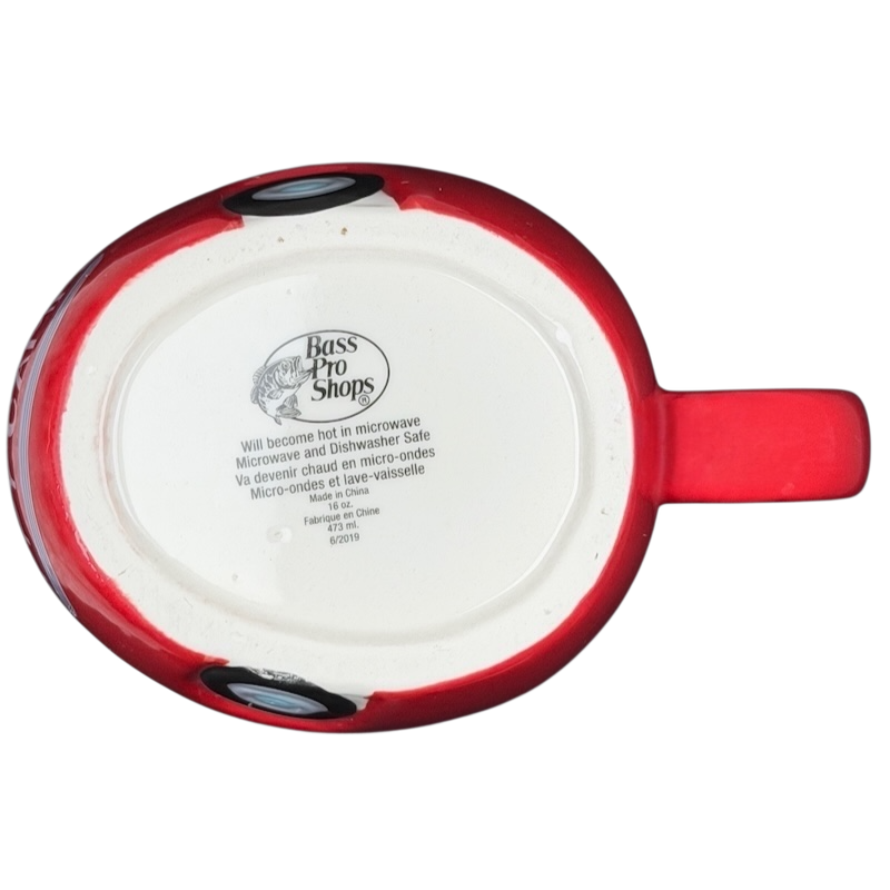 Bottom view of the Happy Camper red RV Bass Pro Shops mug with care instructions
