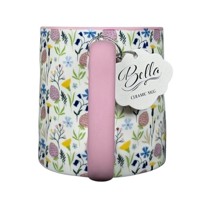 Bella dimpled wildflower mug with pink handle, featuring colorful floral patterns for a charming look