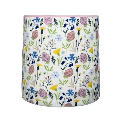 Bella dimpled wildflower mug with pink handle featuring colorful floral design on white ceramic