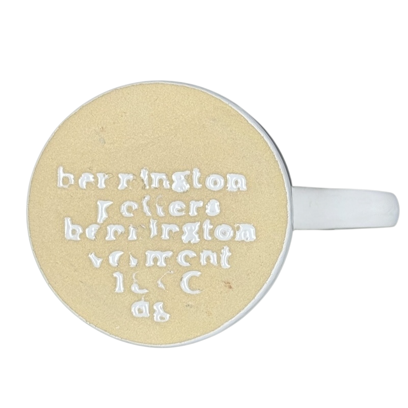 Top view of mug base with embossed Bennington Potters mark white handle Bennington Pottery Smithsonian vintage collectible mug
