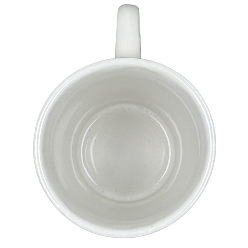 Top down view of plain white ceramic mug with handle visible Bennington Pottery Smithsonian vintage collectible mug