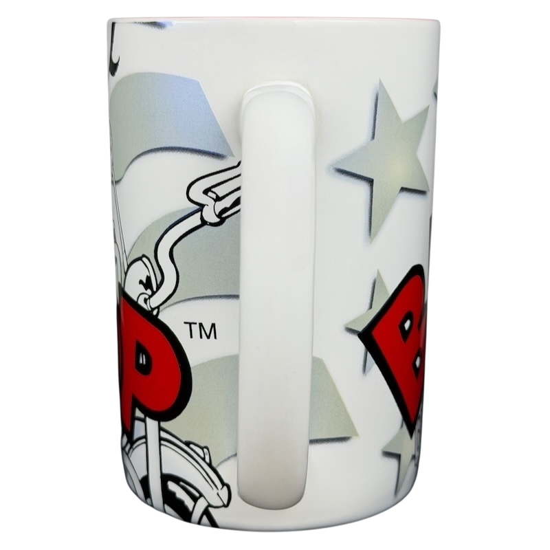 Betty Boop motorcycle Universal Studios mug featuring a colorful design with stars and a bike