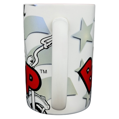 Betty Boop motorcycle Universal Studios mug featuring a colorful design with stars and a bike