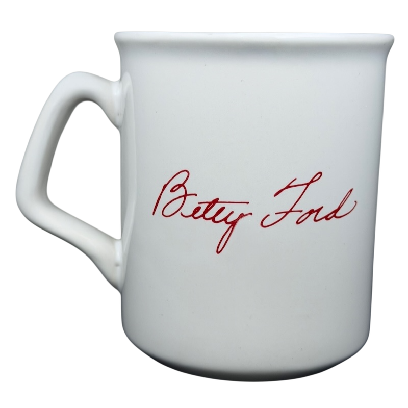 White ceramic mug featuring the signature of Betty Ford from the Betty Ford Center At Eisenhower