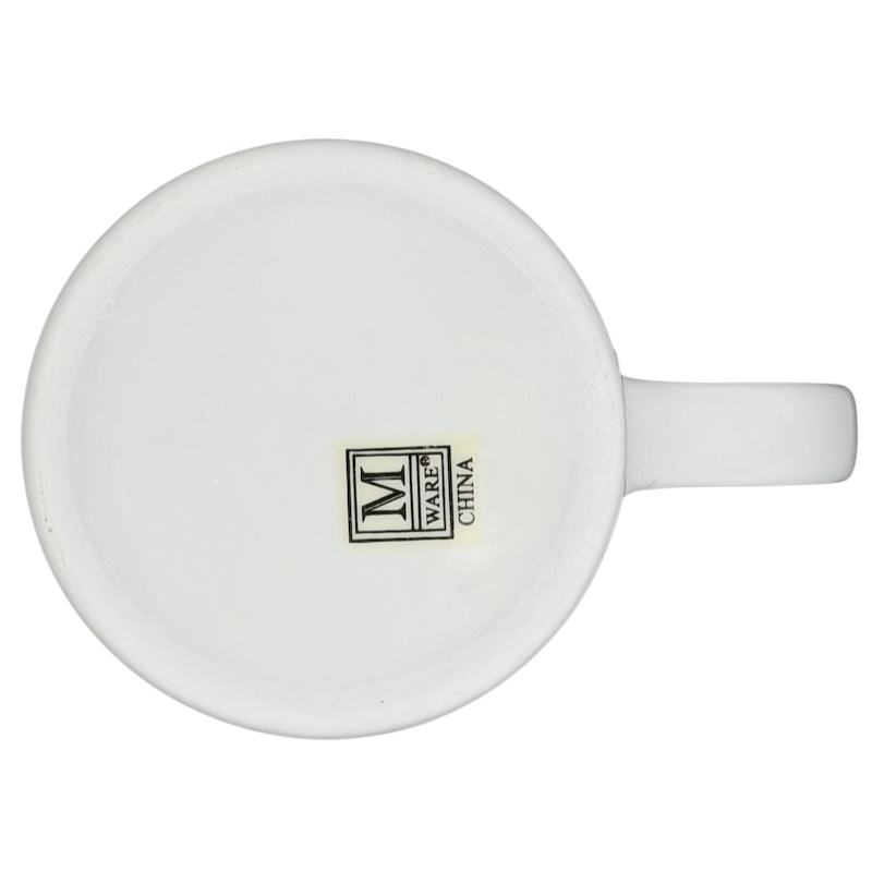 Bottom view of M Ware Betty Ford Center signature mug showcasing brand logo and design