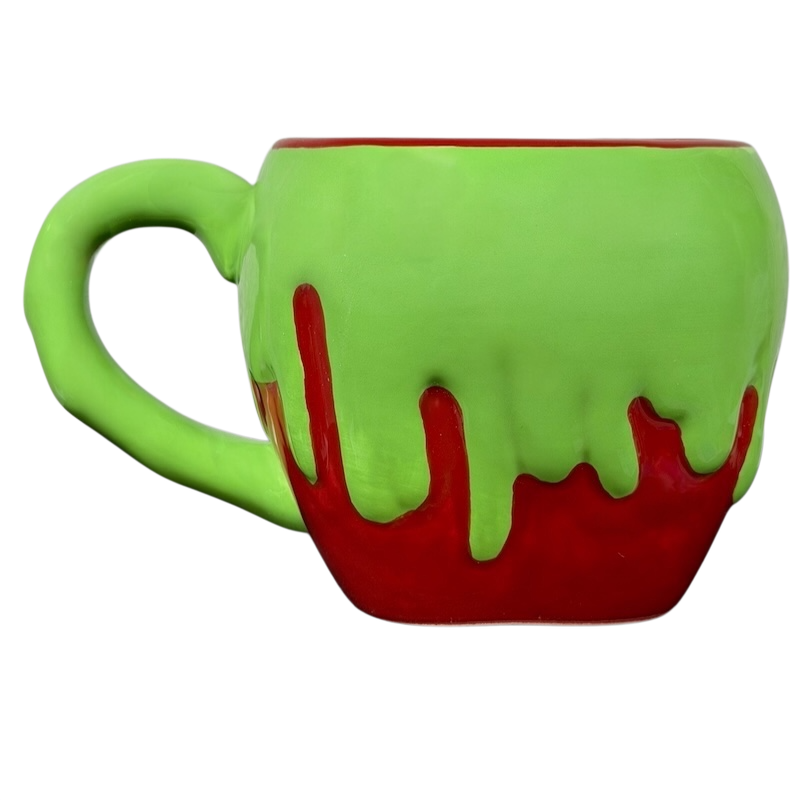 Snow White Evil Queen Green Poison Apple Mug Bioworld Disney with a dripping design featuring green and red colors