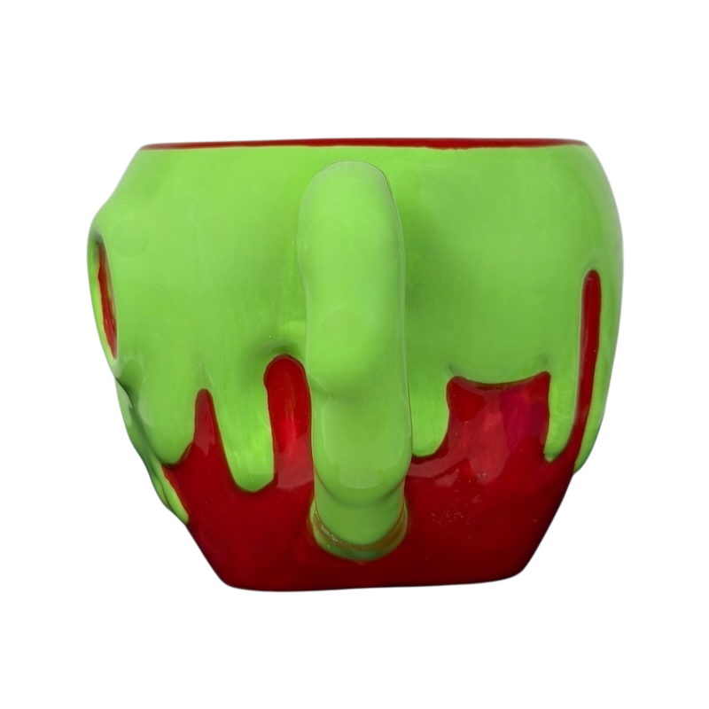 Disney Snow White Evil Queen Green Poison Apple Mug Bioworld with a vibrant green dripping design