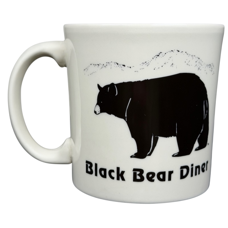 Black Bear Diner Mug Homer Laughlin China featuring a black bear silhouette and mountain design