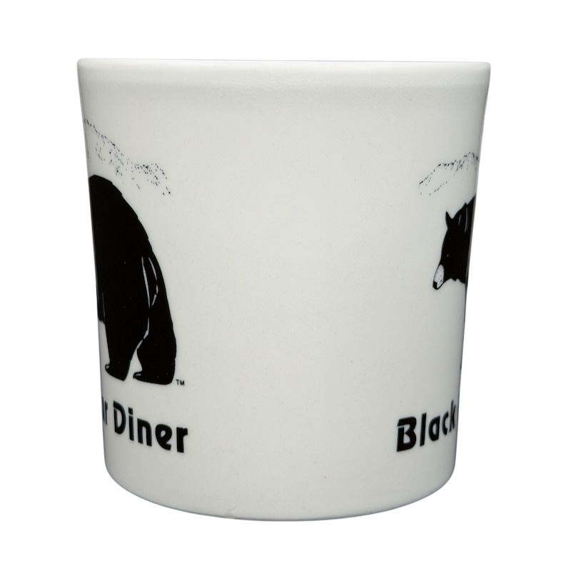 Black Bear Diner Mug Homer Laughlin China featuring a bold bear design on a white background