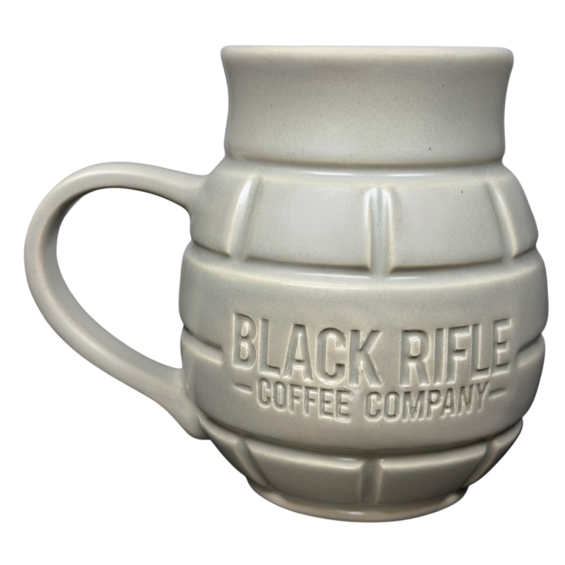 Black Rifle Coffee Company Grenade Mug in light color with textured design and sturdy handle