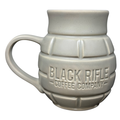 Black Rifle Coffee Company Grenade Mug in light color with textured design and sturdy handle