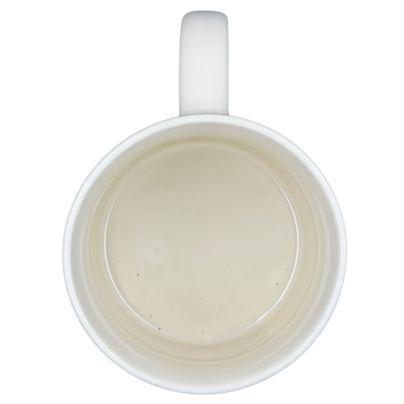 Interior view of Bloom's Coffee vintage mug in classic white ceramic design