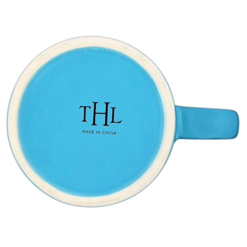 Top view of THL #Blessed blue collectible mug showcasing its vibrant design and craftsmanship