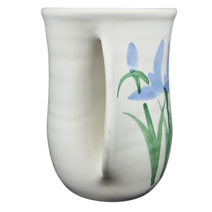Blue Iris Hand Warmer Neher Mug with a delicate floral design and ergonomic handle