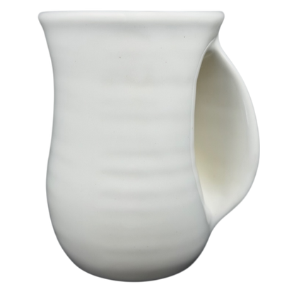 Blue Iris Hand Warmer Neher Mug in white ceramic with a unique curved handle for warmth and comfort