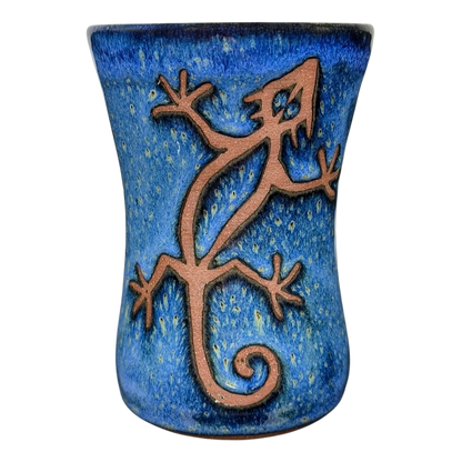 Blue Speckled Gecko Pottery Mug featuring a lizard design on a vibrant blue background