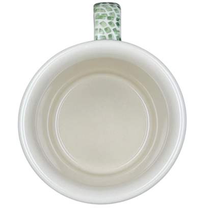 Interior view of a Boleslawiec forget-me-not mug showcasing its smooth ceramic finish