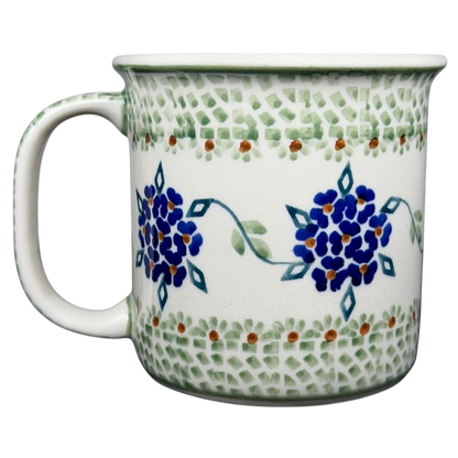 Boleslawiec forget-me-not mug featuring blue floral design and green accents on a white background