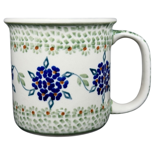 Boleslawiec forget-me-not mug featuring blue floral patterns on a cream background