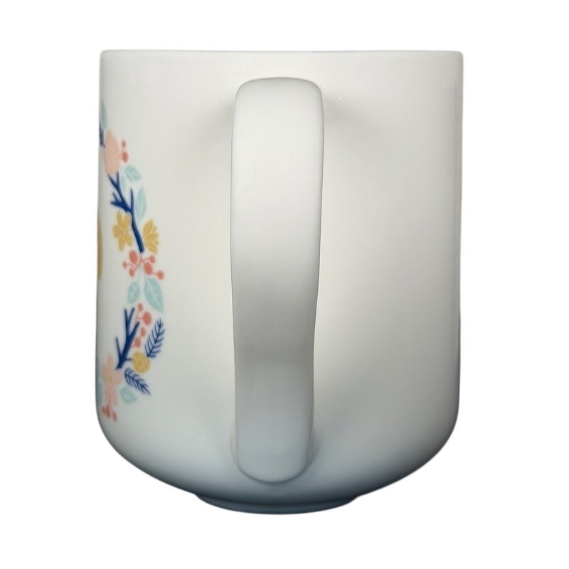 White Threshold Bright Eyed Bushy Tailed Squirrel Mug with floral design on the side