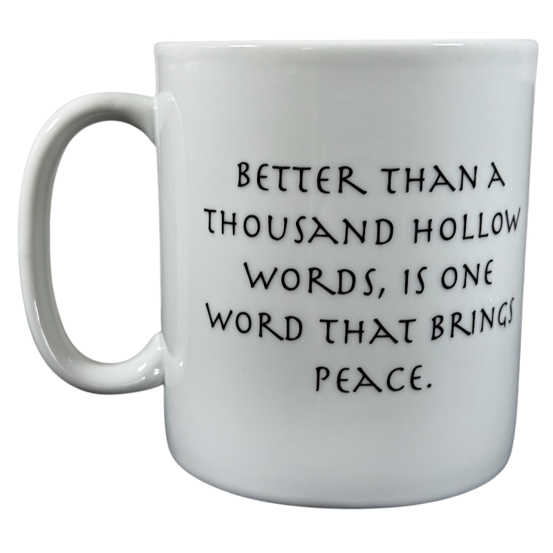 White Buddha collectible Coventry mug with inspirational peace quote in black text