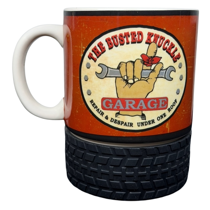 Busted Knuckle Garage Logo Tire Base Mug with a vintage design and textured tire bottom