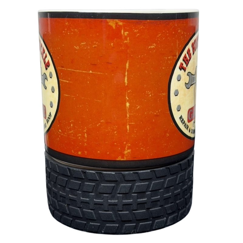 Busted Knuckle Garage Logo Tire Base Mug with an orange and black design for car enthusiasts