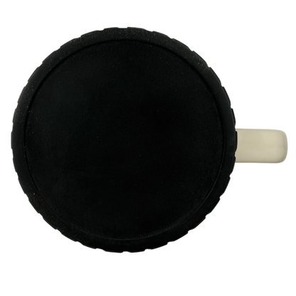 Black bottom view of Busted Knuckle Garage Logo Tire Base Mug by Open Road Brands