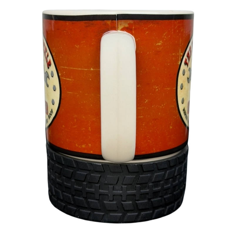Busted Knuckle Garage Logo Tire Base Mug featuring a durable tire design and a bold logo