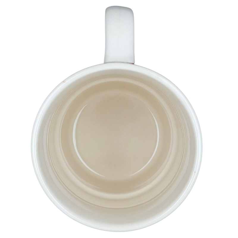 Inside view of the Busted Knuckle Garage Logo Tire Base Mug with a smooth white interior