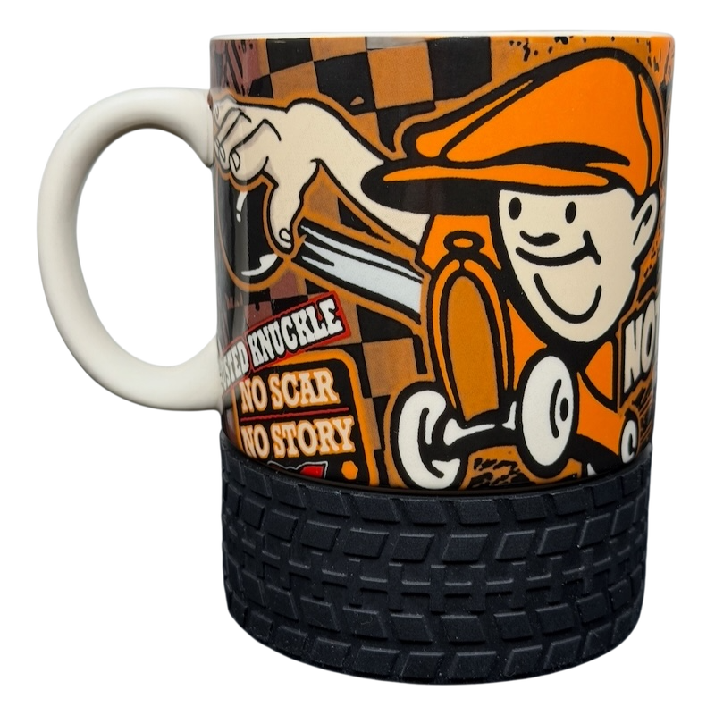Busted Knuckle Garage Tire Base Mug featuring cartoon design and textured tire base for car enthusiasts