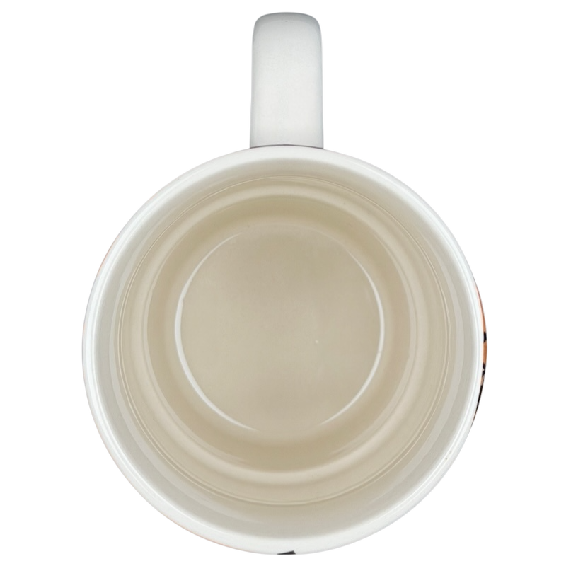 Inside view of the Busted Knuckle Garage Tire Base Mug, ideal for car enthusiasts and coffee lovers