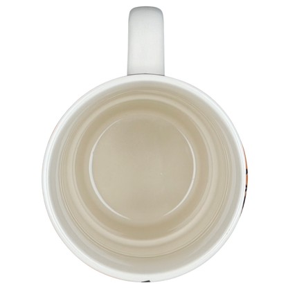 Inside view of the Busted Knuckle Garage Tire Base Mug, ideal for car enthusiasts and coffee lovers