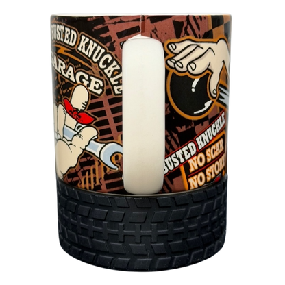 Busted Knuckle Garage Tire Base Mug with bold graphics and a unique tire design for automotive enthusiasts
