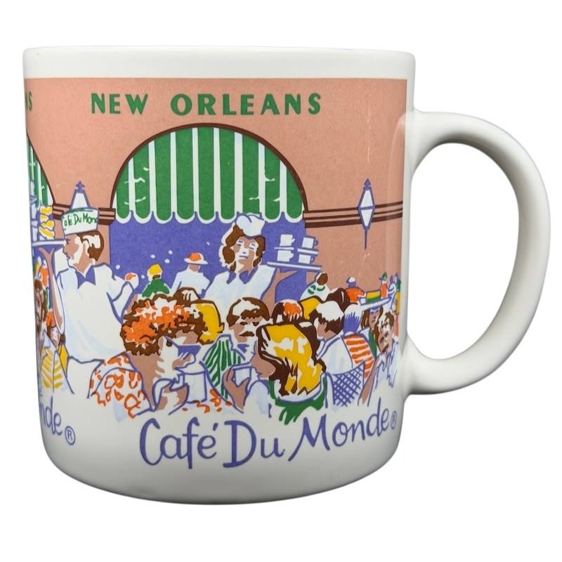 Cafe Du Monde New Orleans French Quarter Mug featuring vibrant artwork of the famous cafe scene