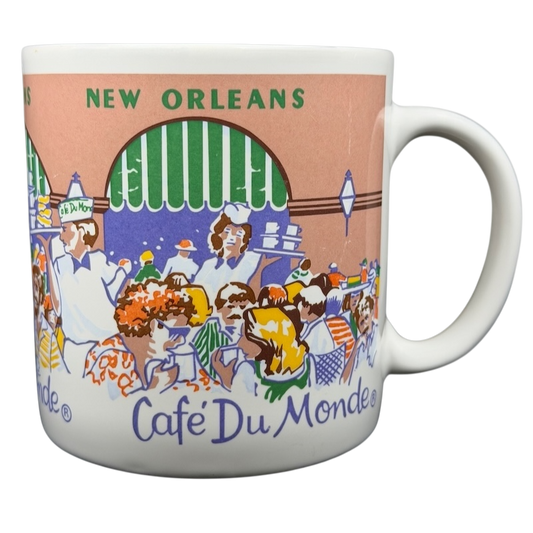 Cafe Du Monde New Orleans French Quarter Mug featuring vibrant artwork of the famous cafe scene