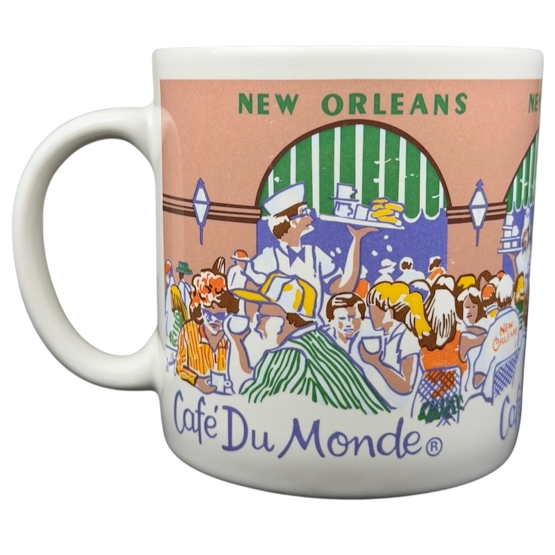 Cafe Du Monde New Orleans French Quarter Mug featuring vibrant artwork of the iconic café scene