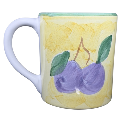 Caleca Frutta Pear and Plums mug featuring hand-painted plums on a yellow background