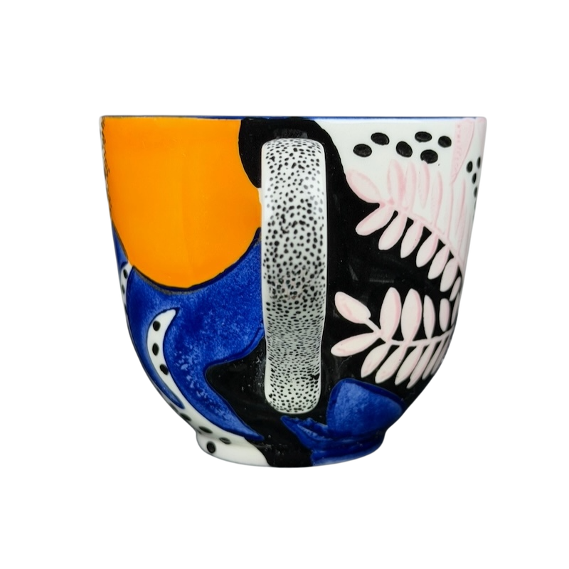 Colorful Cassie Byrnes Anthropologie Mug featuring abstract patterns and a unique shape