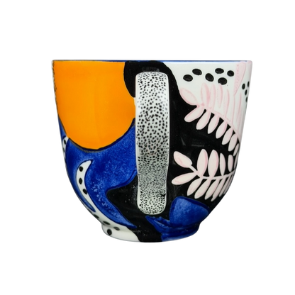 Colorful Cassie Byrnes Anthropologie Mug featuring abstract patterns and a unique shape