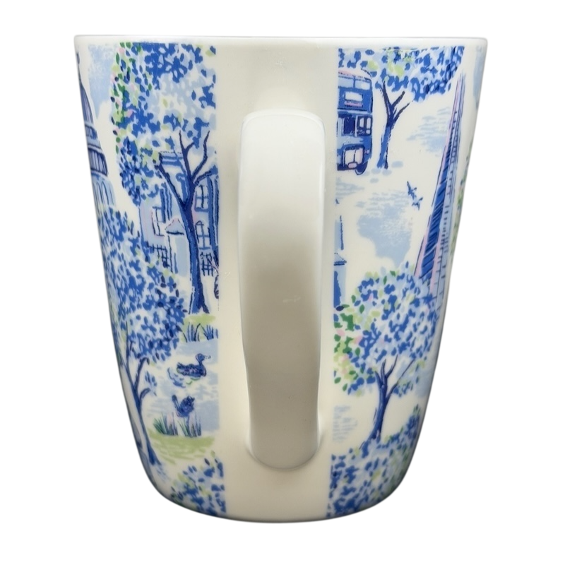 Cath Kidston London mug featuring a charming blue and white design of trees and buildings