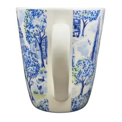 Cath Kidston London mug featuring a charming blue and white design of trees and buildings
