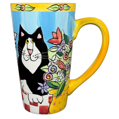 Catzilla Candace Reiter Designs Cats Flowers Mug featuring a black cat among colorful flowers