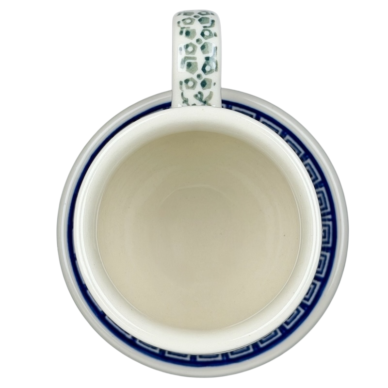 Top view of Polish Pottery Tea Infuser Brewing Boleslawiec Mug Ceramika Artystyczna with intricate design