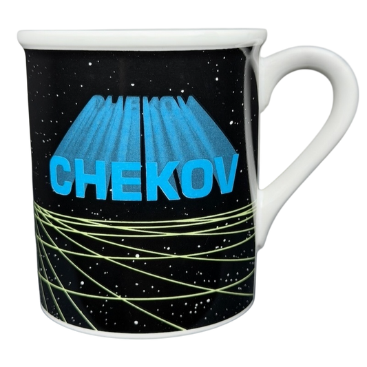 Chekov Star Trek vintage mug featuring bright blue text and a space-themed design