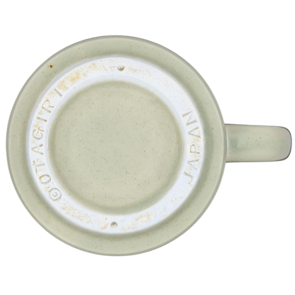 Bottom view of Classic Cars Mug vintage Otagiri showcasing the maker's mark and speckled ceramic detail