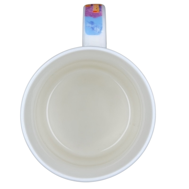 Interior view of a Claude Monet Antibes Salis Gardens collectible mug showcasing a clean design