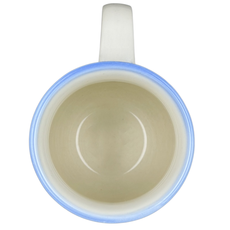 Interior view of Coastal Seashell vintage Mug Otagiri showcasing smooth finish and blue rim