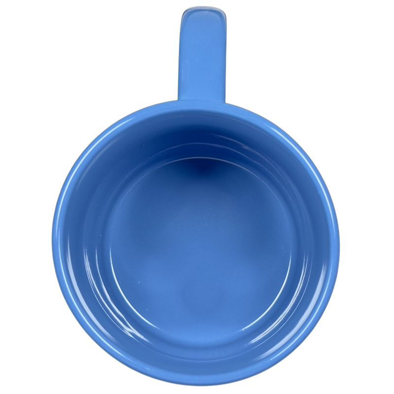 Top view of a blue Disney collectible Stitch mug purchase featuring a smooth glossy finish